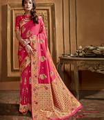 Pink woven banarasi silk saree with blouse