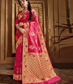 Pink woven banarasi silk saree with blouse