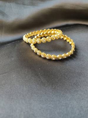 Golden Bangles 1
