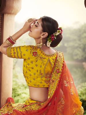 Yellow embroidered silk semi stitched lehenga 3