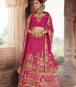 Rani-pink embroidered silk semi stitched lehenga