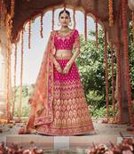 Rani-pink embroidered silk semi stitched lehenga