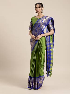 Green woven silk blend saree with blouse 1