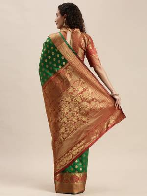 Green woven silk blend saree with blouse 2