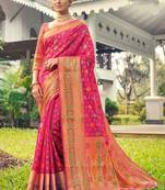 Pink woven banarasi silk saree with blouse
