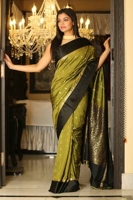 Green woven silk saree with blouse 1