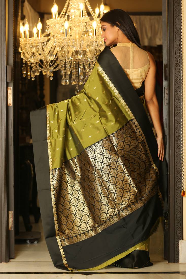 Green woven silk saree with blouse