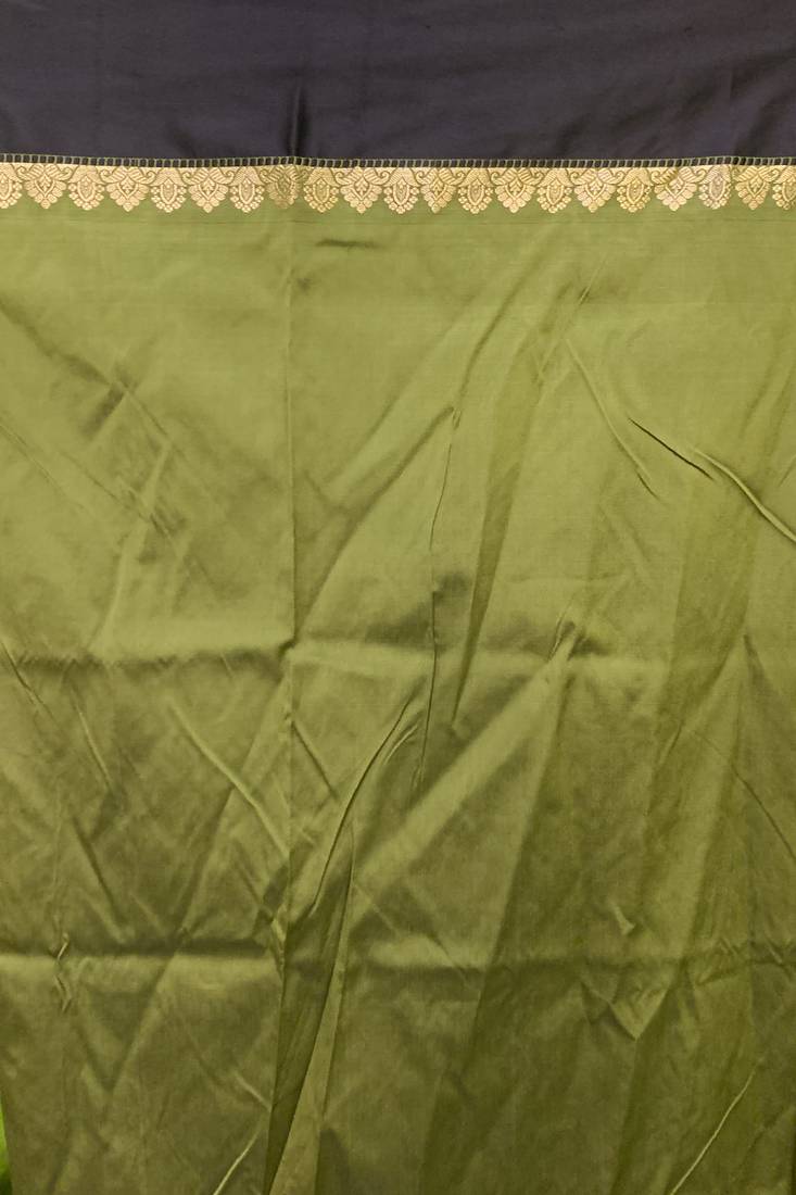 Green woven silk saree with blouse