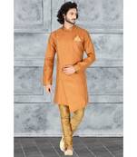 Mens rust  jacquard angarakha  cut  indowestern  with elegant golden buttons and self cording on the collar and pocket