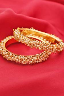 Designer Golden Bunched Pearl Bridal Wedding Bangle Set