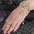 Golden and white pearl hand harness