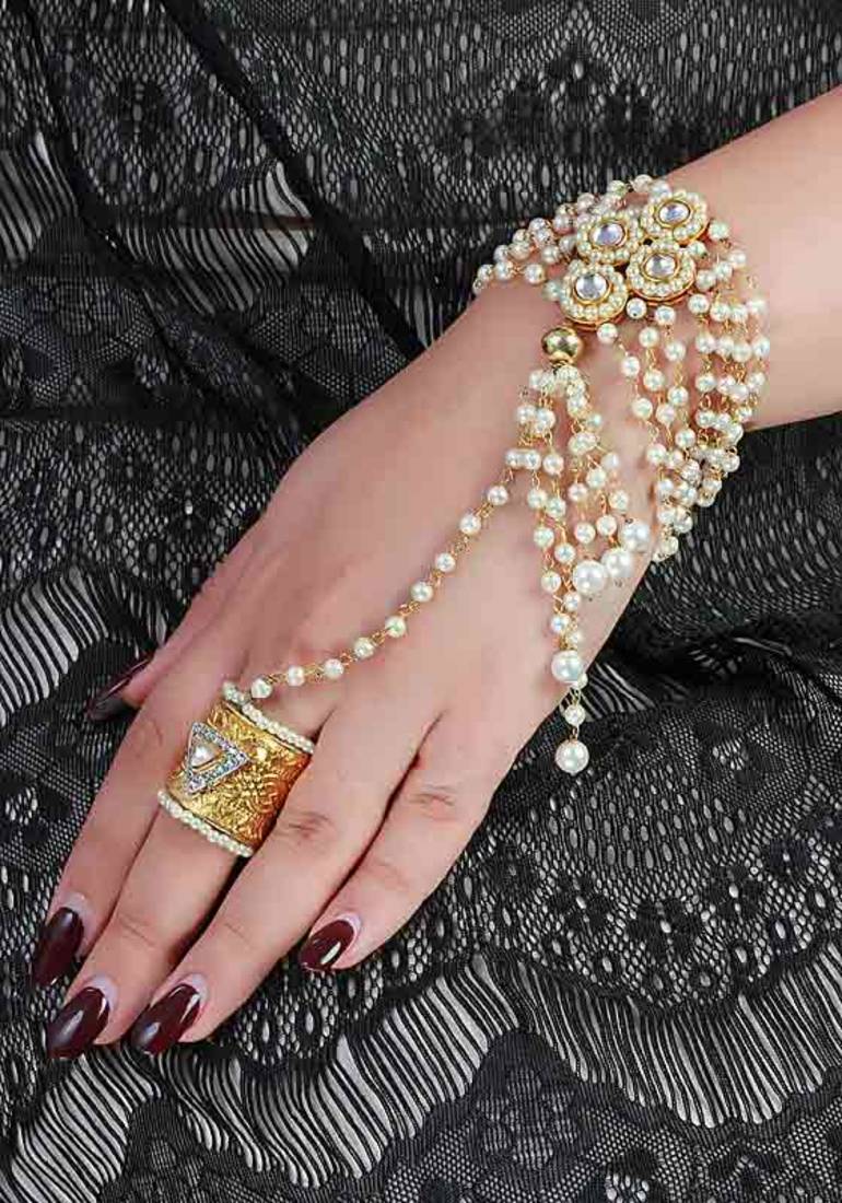 Golden and white pearl hand harness