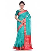 Dark green woven chiffon saree with blouse