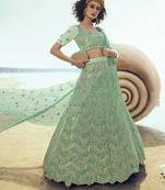Green sequins embroidered net Semi Stitched Lehenga