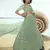 Green sequins embroidered net semi stitched lehenga