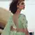 Green sequins embroidered net semi stitched lehenga