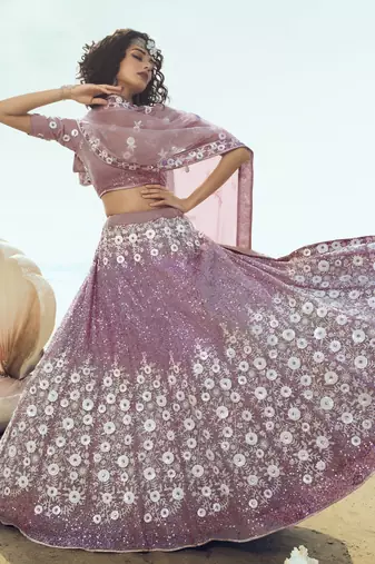 Lilac thread and sequins embroidered net semi stitched lehenga