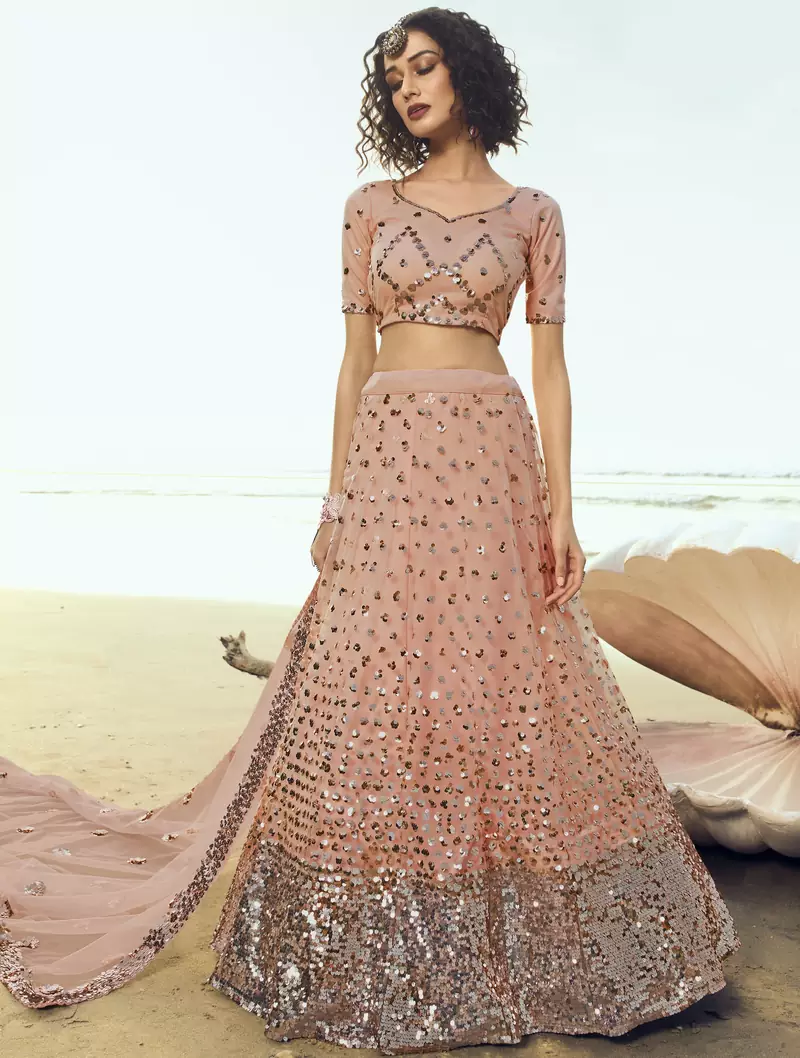 Peach sequins embroidered net semi stitched lehenga