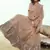Peach sequins embroidered net semi stitched lehenga