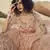 Peach sequins embroidered net semi stitched lehenga