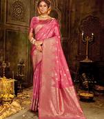 Pink woven banarasi silk saree with blouse