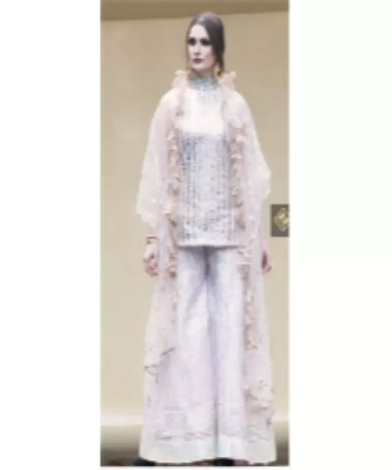 Short kurta with all over embroidered with silver ghota and sharara with silver patti.