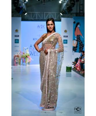 Net with florets sequins embroidered saree 1