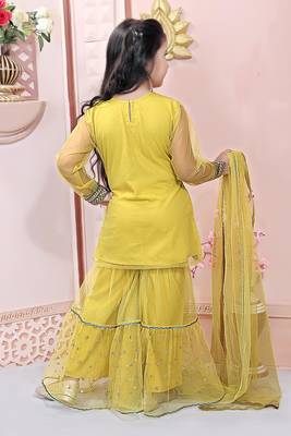 Yellow embroidered net kids salwar suits 5