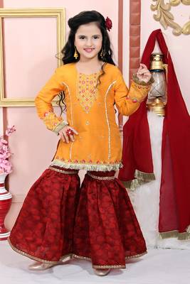 Yellow embroidered cotton silk kids salwar suits 1