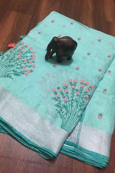 blue Handcrafted Linen Saree with embroiderywork on the saree