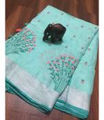 blue Handcrafted Linen Saree with embroiderywork on the saree