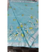blue Handcrafted Linen Saree with embroidery work on the saree