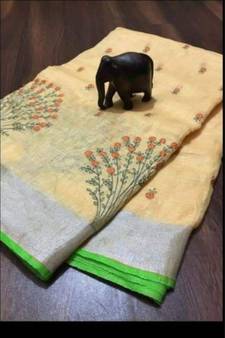 cream Handcrafted Linen Saree with embroidery work on the saree