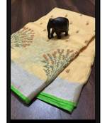 cream Handcrafted Linen Saree with embroidery work on the saree