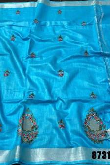 blue Handcrafted Linen Saree with embroidery work on the saree