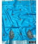 blue Handcrafted Linen Saree with embroidery work on the saree