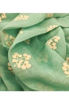 green Handcrafted Linen Saree with embroidery work on the saree