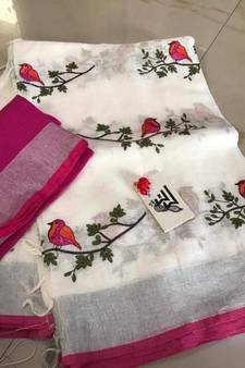 white Handcrafted Linen Saree with embroidery work on the saree