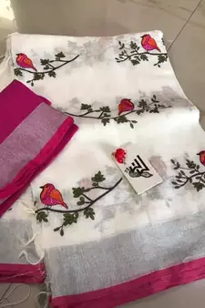white Handcrafted Linen Saree with embroidery work on the saree
