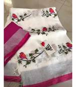 white Handcrafted Linen Saree with embroidery work on the saree