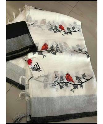 white Handcrafted Linen Saree with embroidery work on the saree 1