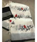 white Handcrafted Linen Saree with embroidery work on the saree