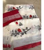 white Handcrafted Linen Saree with embroidery work on the saree