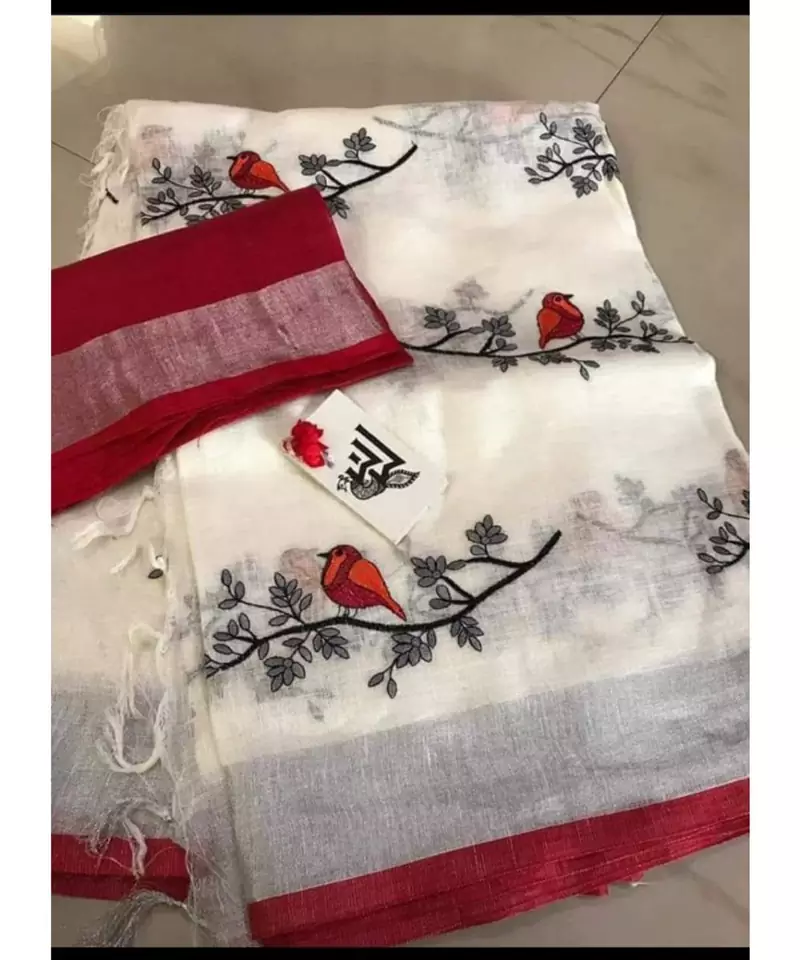 white Handcrafted Linen Saree with embroidery work on the saree