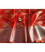 red Handcrafted Linen Saree with embroidery work on the saree