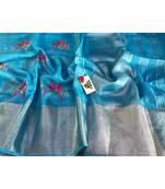 blue Handcrafted Linen Saree with embroidery work on the saree