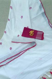 white ?Handcrafted Linen Saree with small flower embroidery work
