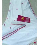white ?Handcrafted Linen Saree with small flower embroidery work