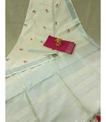 white Handcrafted Linen Saree with small flower embroidery work