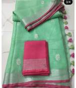 green Handcrafted Linen Saree with small flower embroidery work
